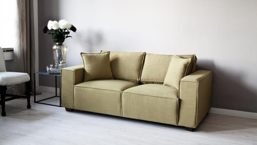 zielona sofa dwuosobowa