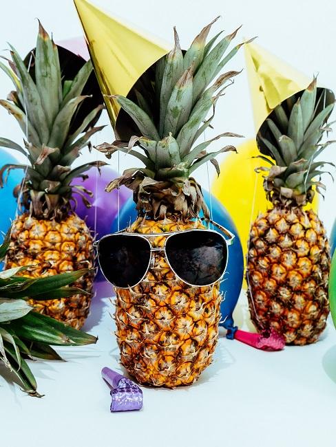 festa hippie ananas con occhiali da sole
