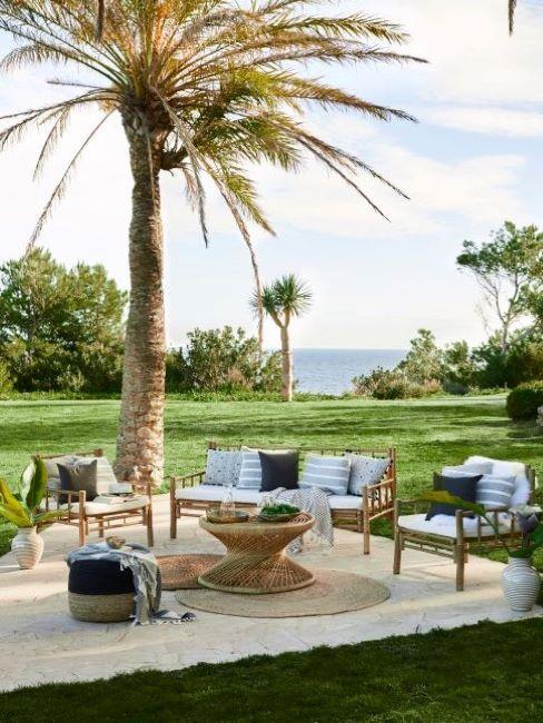 progettare un giardno giardino grande con palma e mobili da esterno