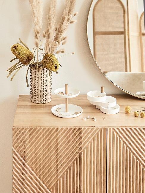 Etagere as jewelry storage on a sideboard in the bedroom