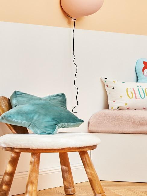 Balloon in pink on a wall in the girl's nursery