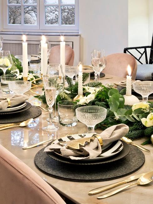 Christmas table decorations on a marble table in the dining area