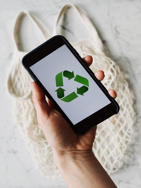 movil con simbolo de reciclar