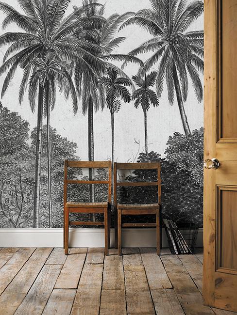 deux chaises en bois avec tapisserie tropicale noir et blanc