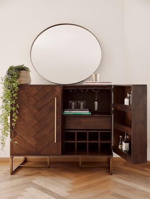 buffet en bois avec grand miroir rond