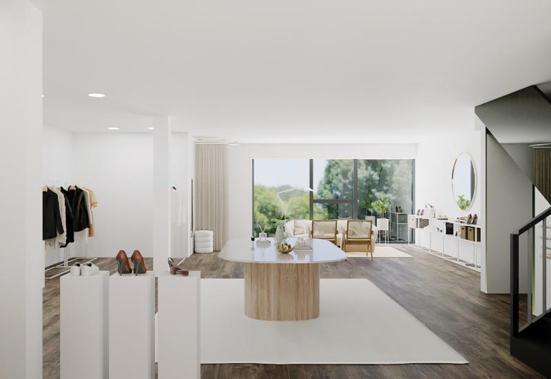 Showroom perspective d'ensemble style épuré matériaux meubles de qualité