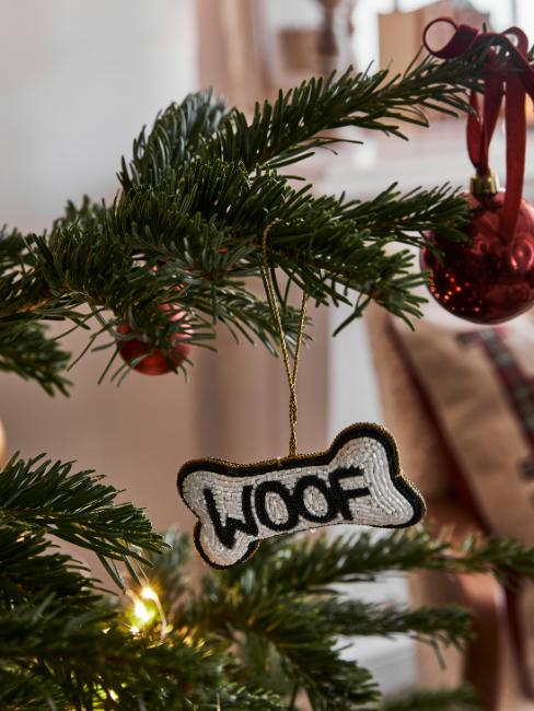 déco de sapin de Noël en forme d'os avec inscription woof