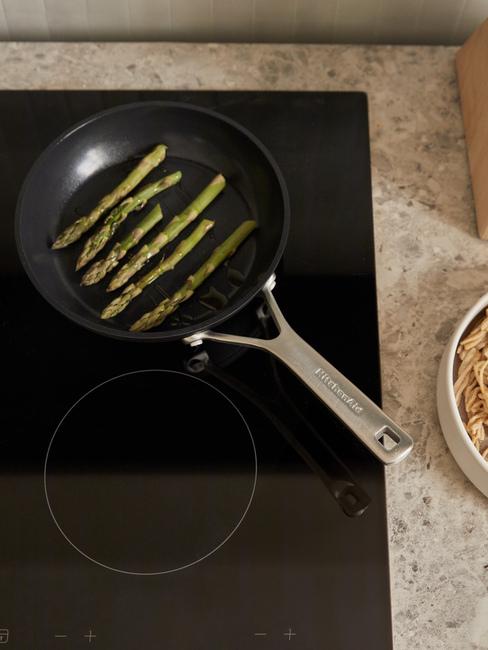 pulire il piano cottura a induzione