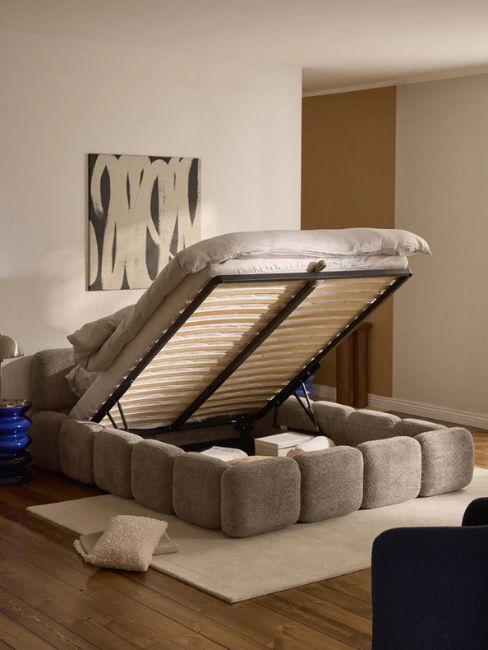 letto con contenitore grigio