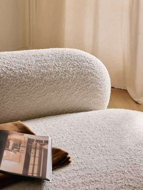 dettaglio poltrona senza braccioli bianca