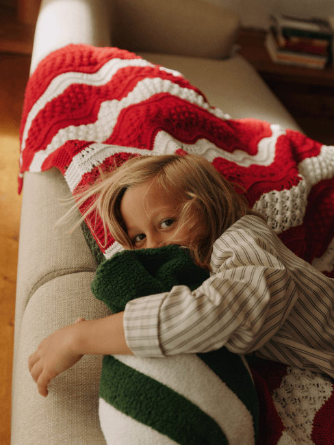 cuscini e coperte a righe