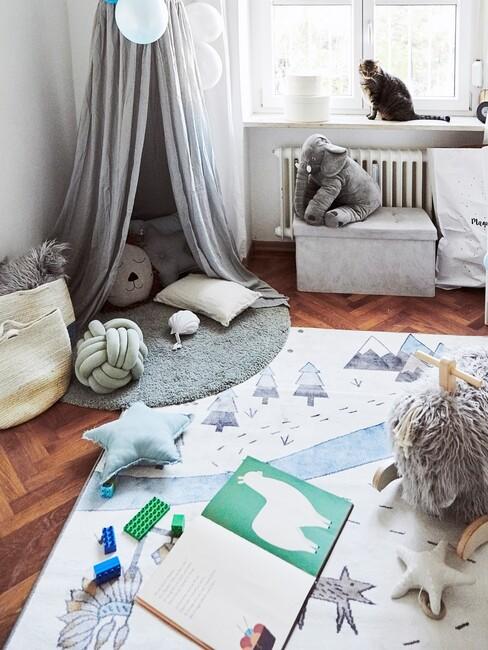 grijze tipi tent met een kinder boek