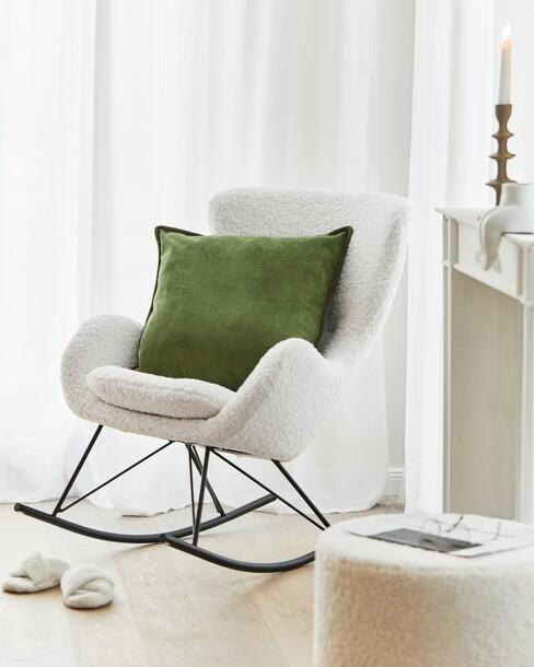 teddy fauteuil met groen kussen