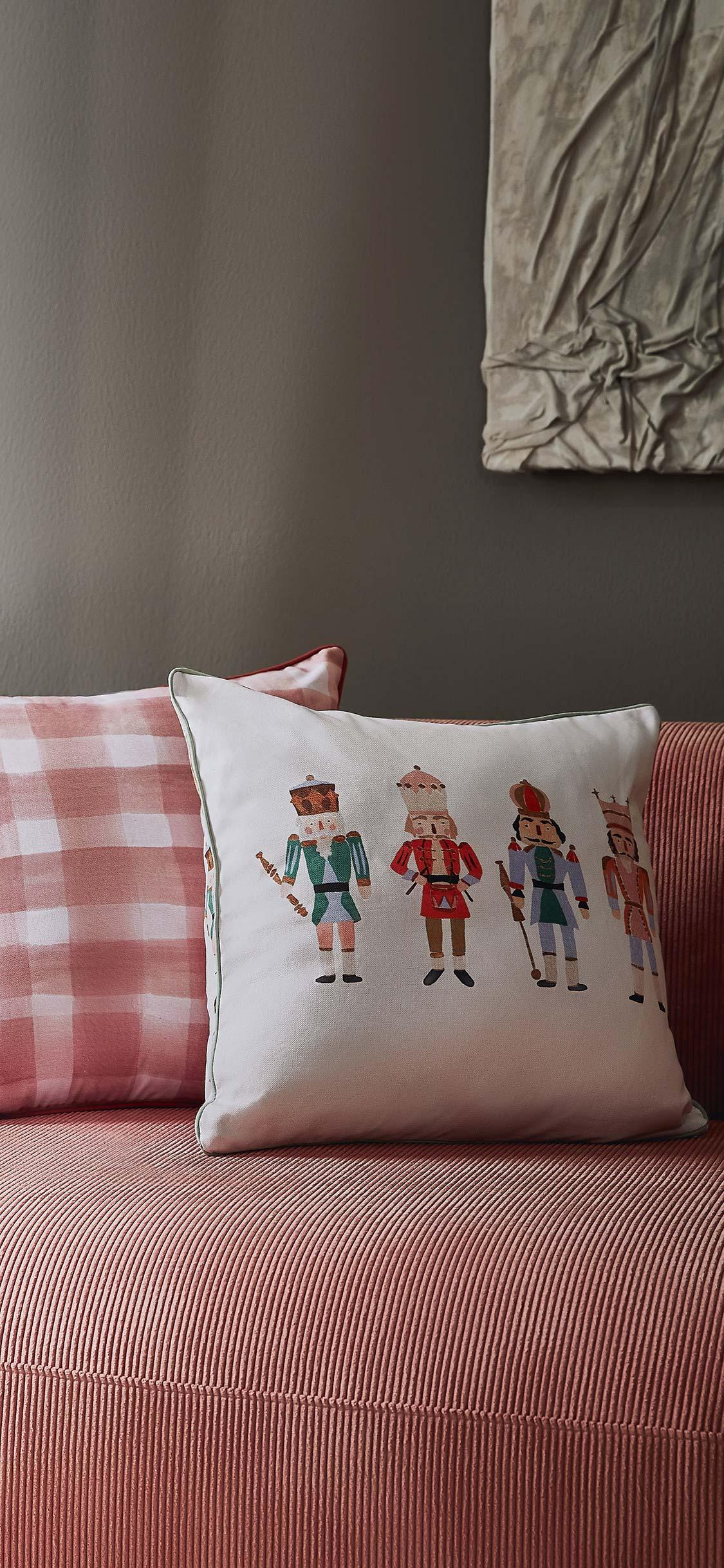 Tło na telefon z różową sofą ze sztruksu