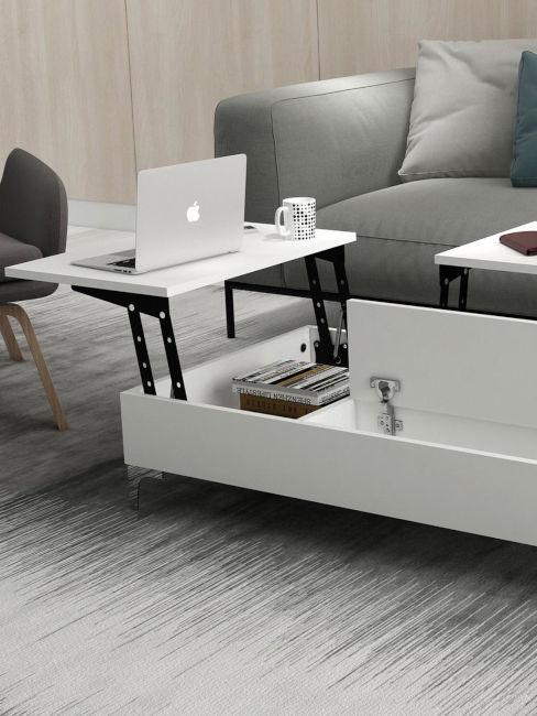 Szara sofa z wysuwanym stolikiem na laptopa