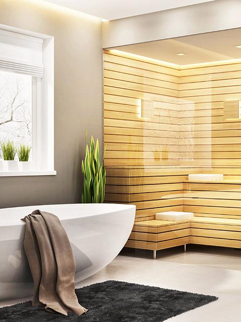 sauna obok wanny w łazience