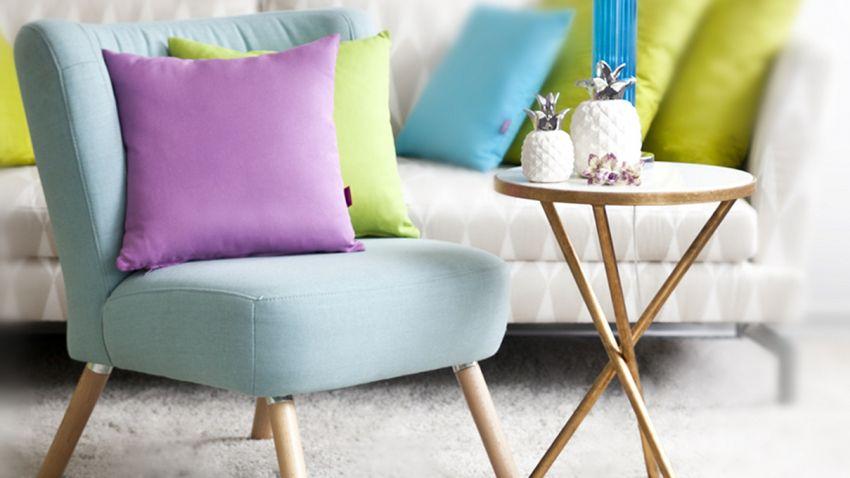 Fauteuil cocktail en tissu bleu