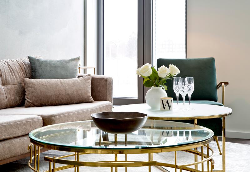 Ronde glazen salontafel met goud onderstel
