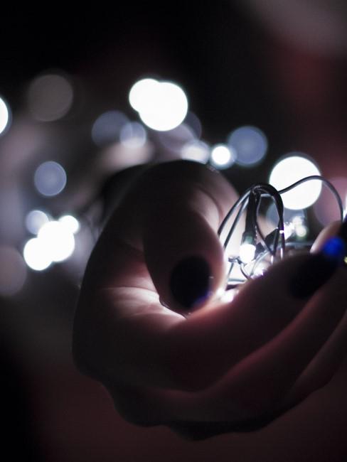 loteria-navidad-banner luces en una mano