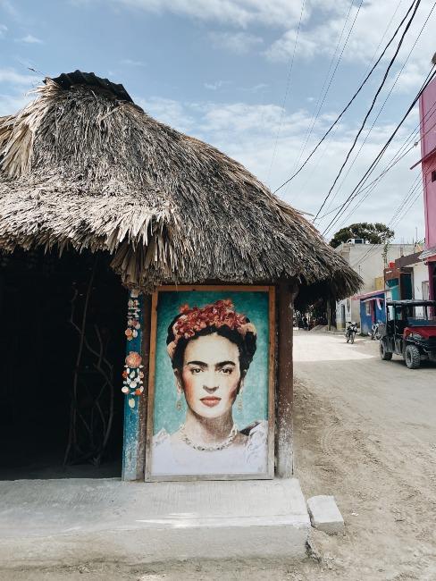 darian-conradie-wPO-BKq96sc-unsplash (1) Dessin de Frida Kahlo sur mur