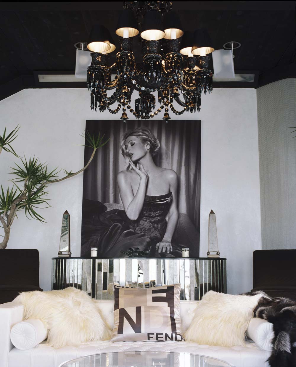 Glamorous room with sofa and chandelier